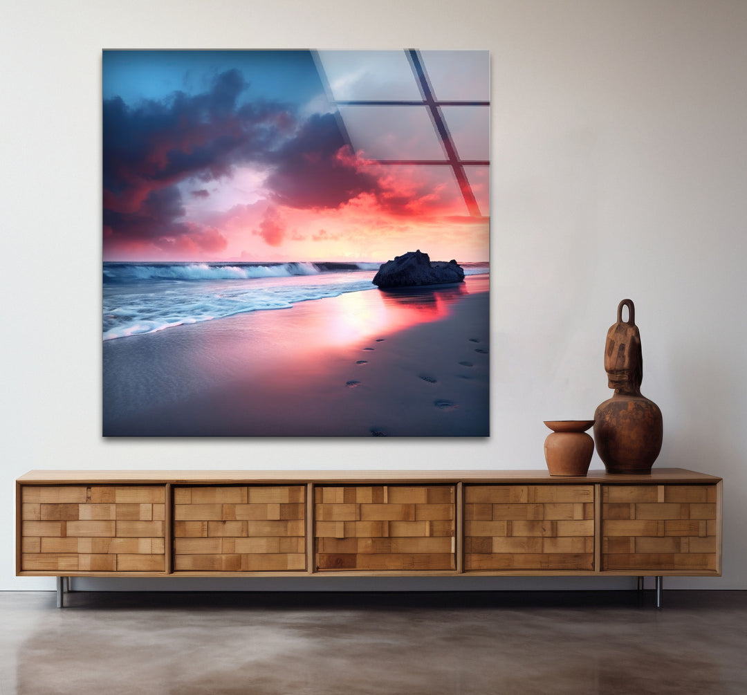 Dramatic Sunset Beach Wall Art – Stormy Sky and Footprints Glass Print for Bold Decor