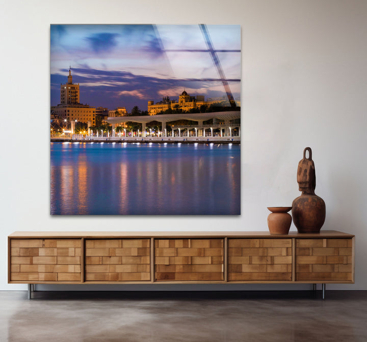 Malaga Waterfront Cityscape Wall Art – Dusk Skyline Glass Print for Urban Decor