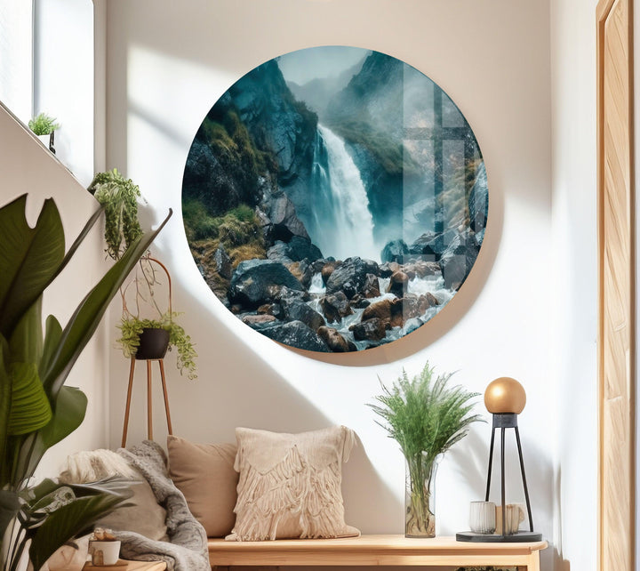 Glass wall art featuring the serene beauty of a misty waterfall scene, bringing nature inside.
