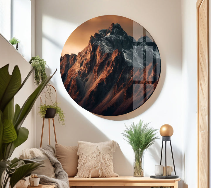 A dramatic glass art print of majestic mountains, perfect for adding a natural touch to your home.

