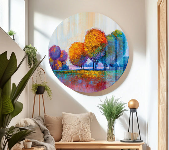 The round colorful autumn forest glass wall art shows vivid trees and reflections and floral design creating forest wall art and stunning wall decor on a white wall
