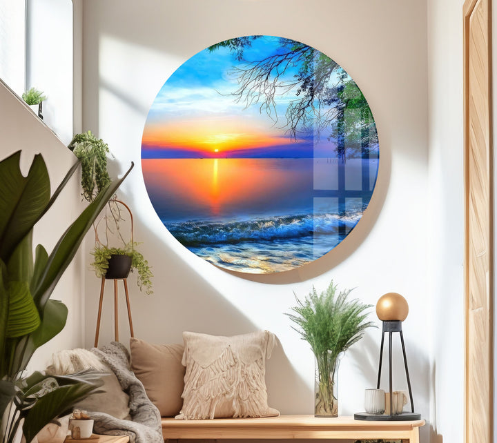 Soothing coastal artwork with a calm sunset and shimmering water, printed on glass.
