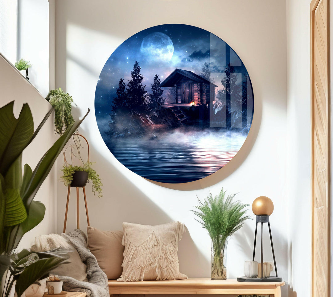 Tranquil glass wall art featuring a misty forest cabin beside a quiet lake.
