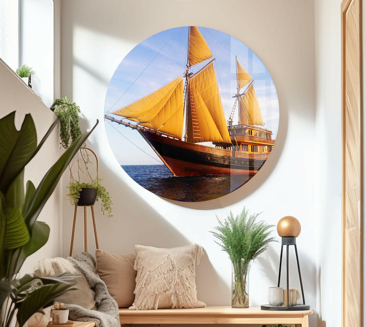 Luxury glass wall art featuring a classic sailing ship against a radiant blue sky and ocean.
