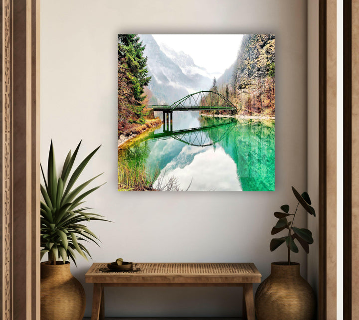 Nature paintings for sale illustrating a scenic valley, a flowing river, and towering mountains.
