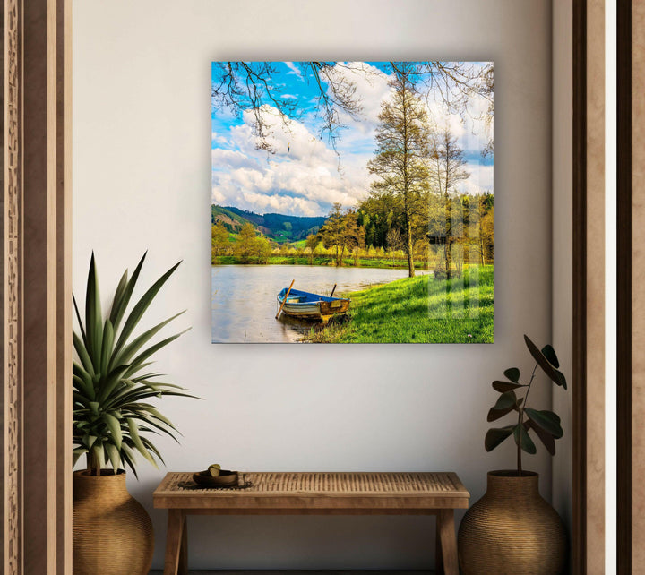 Stunning lake and boat artwork showcasing the beauty of a tranquil countryside scene.
