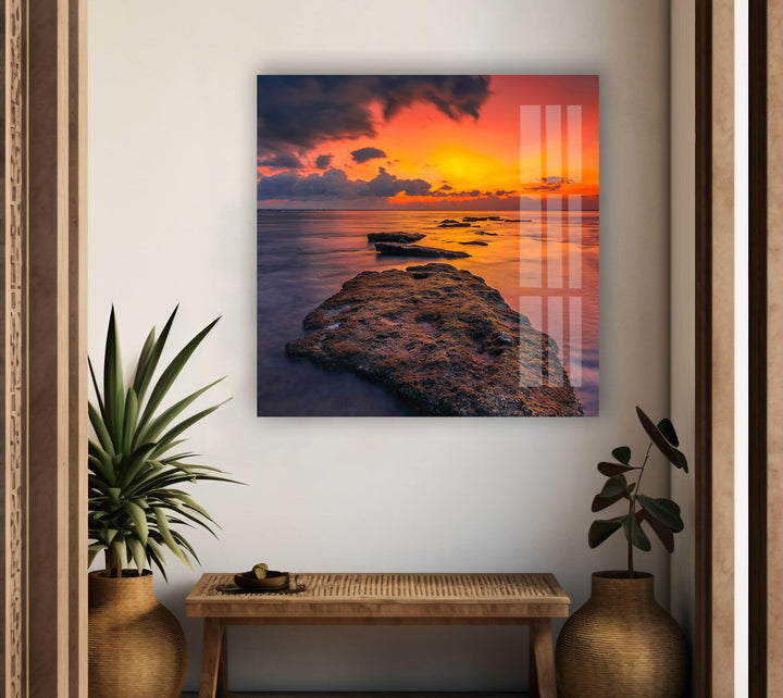 Modern home decor print displaying a scenic beach sunset with rich, warm colors.
