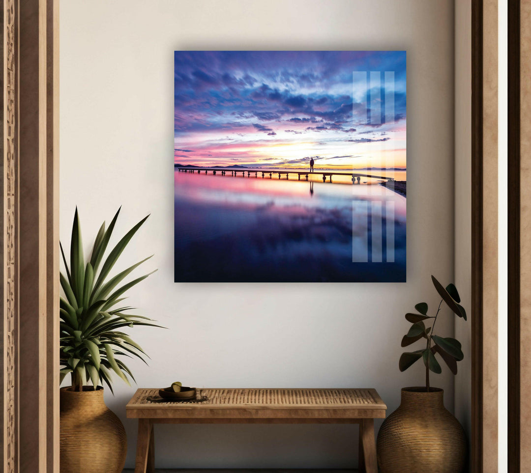 A breathtaking landscape photo for sale capturing a quiet oceanfront pier at sunset.
