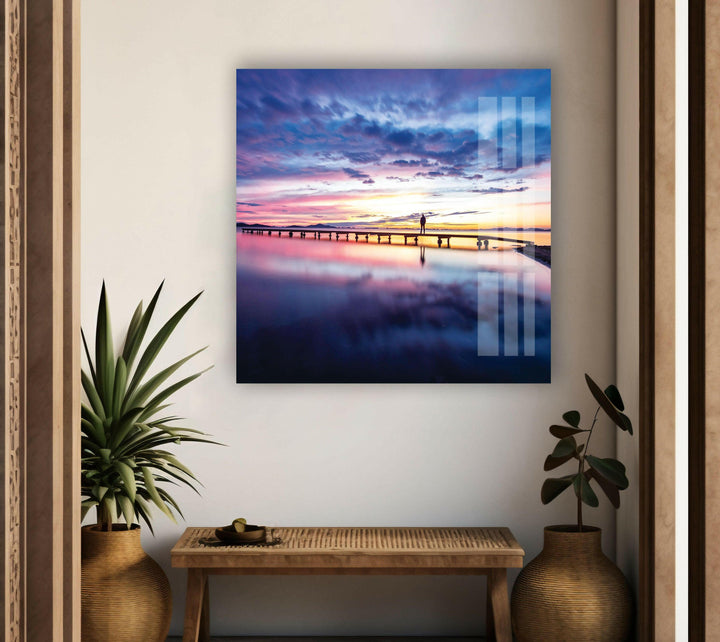 A breathtaking landscape photo for sale capturing a quiet oceanfront pier at sunset.
