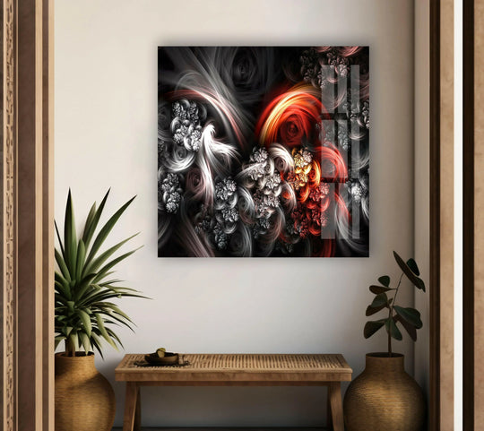 A striking abstract fractal glass wall art with fiery red and black swirls makes a bold statement as unique modern wall decor.