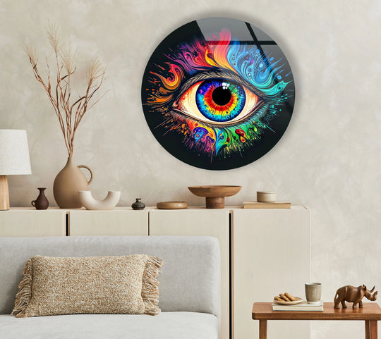 Featuring a sleek black edge, this round psychedelic eye wall art prints showcase a color explosion on glass, adding a bold touch to modern decor.