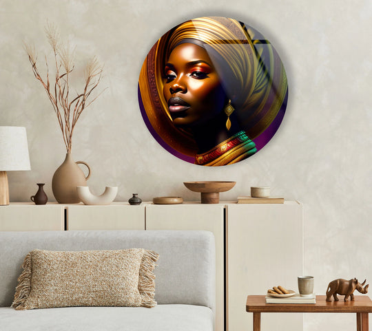 Swirling gold hues animate this striking African woman portrait in a circular glass art painting, giving a sense of constant graceful movement and elegant poise.