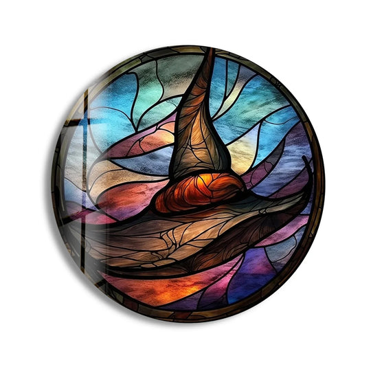 With depth and layers, this round stained glass wall art showcases a witch hat design, offering a unique display of best glass art for Halloween decor.