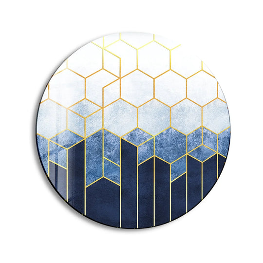 Oriented vertically, this round glass art painting features a gold hexagons pattern in a modern geometric design.