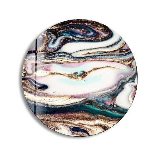Color transitions blend across the fuchsia marble round glass wall artwork, creating an elegant abstract design with swirls of gold, white, and blue.