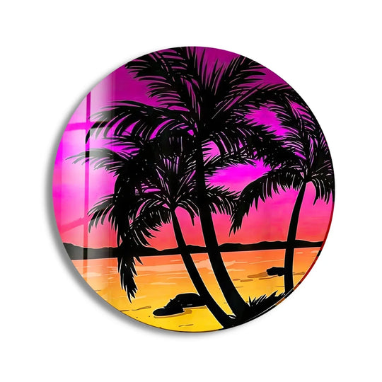 Gradient sunset hues blend in this tropical decorative wall art, transitioning from vivid pinks to warm oranges across the round glass.
