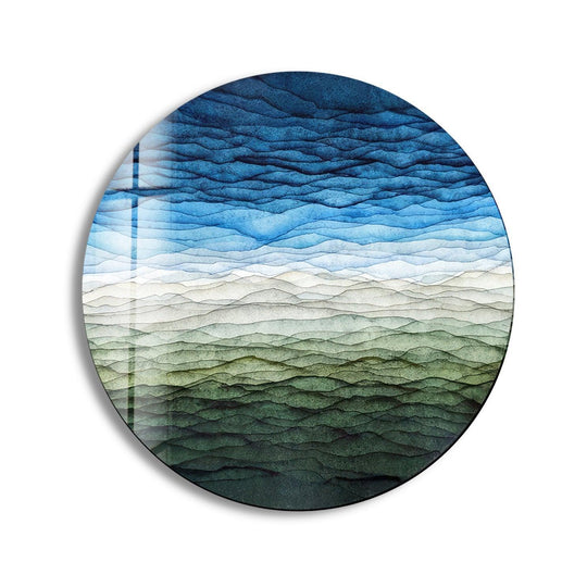 The realistic detail in this blue color gradient abstract round glass wall art decor showcases delicate, wave-like patterns across the surface.
