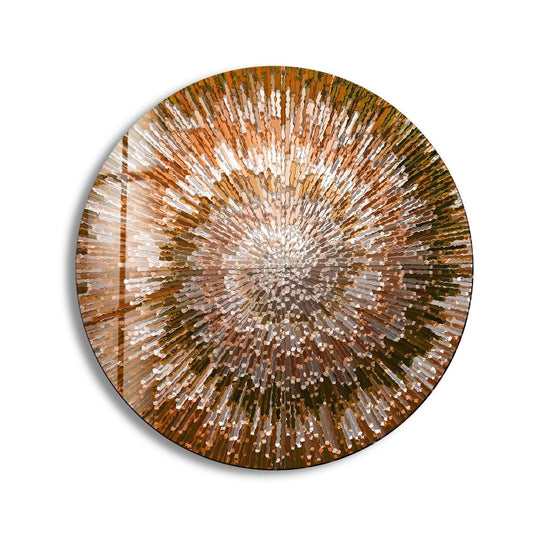 Horizontally oriented round wall art from glass features an orange spiral abstract design, creating a captivating focal point.