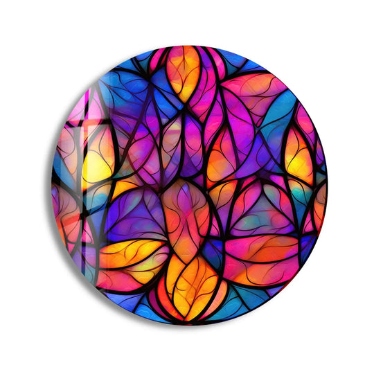 Featuring black lines that define the colorful background of this round, stained purple and orange glass art, the striking glass art brings vibrancy to any room.
