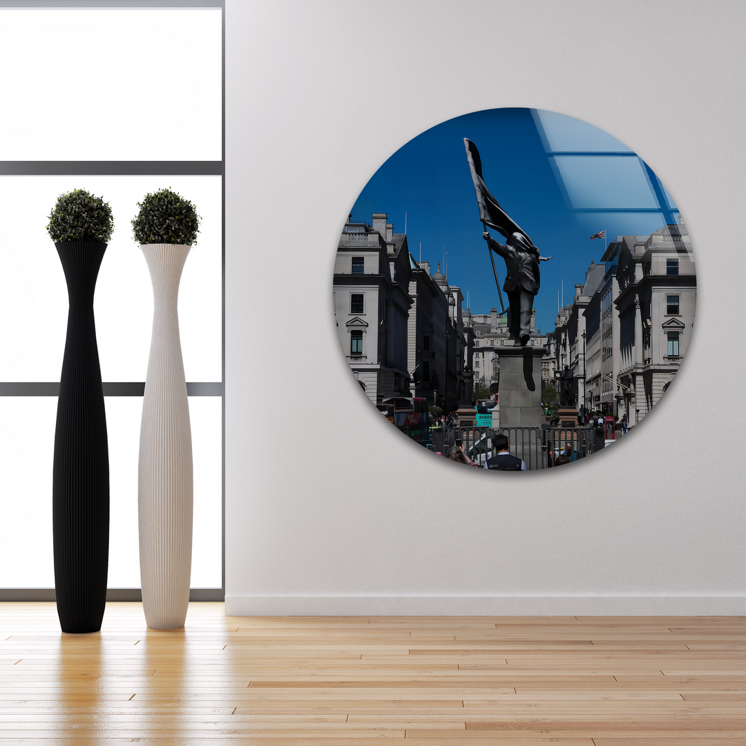 Expansive, bright white window panes and wall illuminate the interior, showcasing a vibrant London New Banksy glass print wall art.