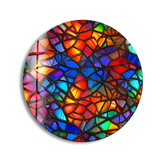 With striking depth and layers, this stained round blue and red glass wall art exemplifies the best glass art through its mosaic of vibrant colors and textured design.