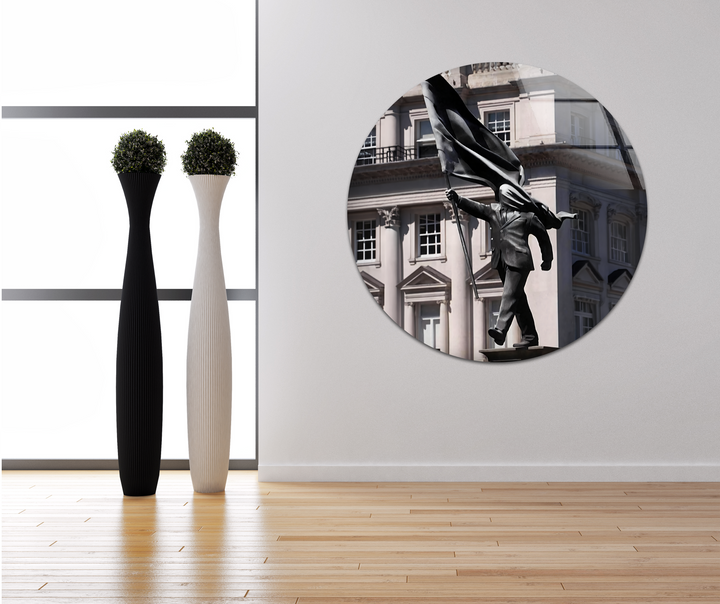 Organic forms from the wind-swept flag and suit of the Banksy sculpture define this powerful best glass art, portraying bold motion.