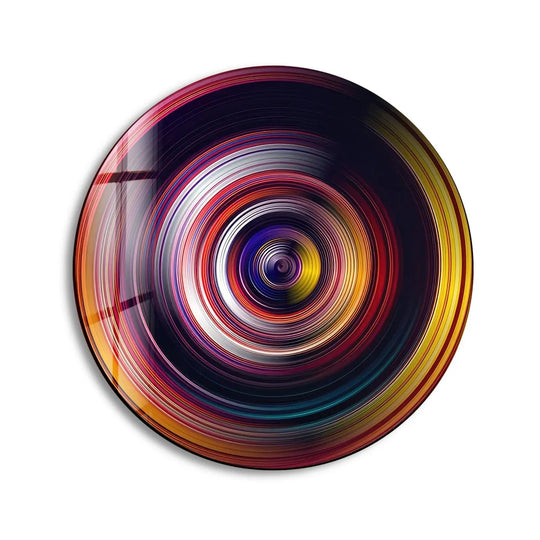Foreground view showing the radiant detail of a yellow black spiral round glass art painting, showcasing the vibrant concentric design on tempered glass.