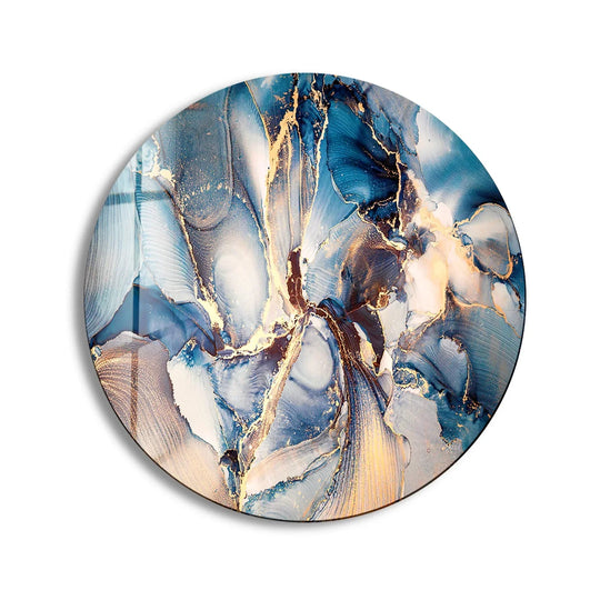 Depicting depth and layers through swirling blues and gold, the round tempered glass wall art showcases a mesmerizing marble pattern, creating an elegant textural effect.