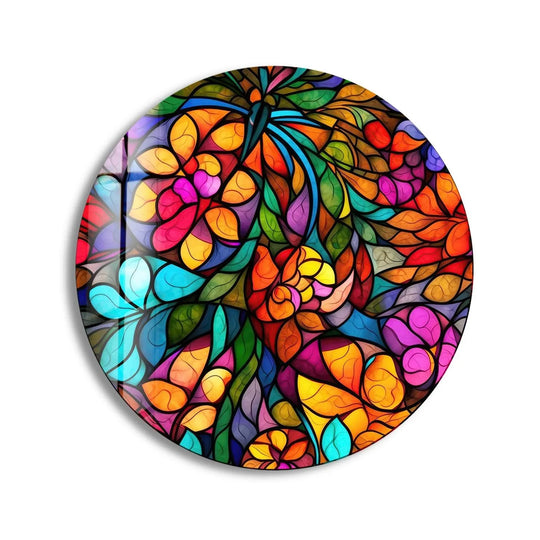 Vibrant fractured forms define the background of this stained colored fractal round glass art, illuminating the intricate details of the overall glass art design.