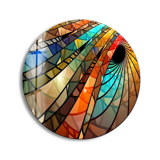 Geometric patterns form a vortex of color in this round glass wall art, showcasing the beauty of stained glass with an array of shapes ideal for finding the best glass art.