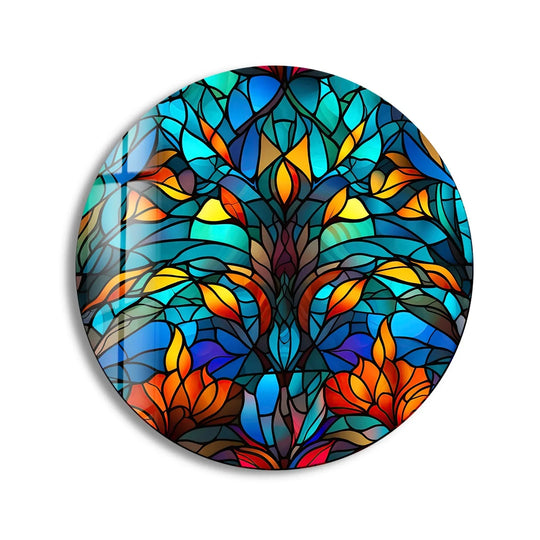 Evoking a contemplative mood, this blue stained round tree glass wall art features a unique modern wall decor pattern with vibrant colors reminiscent of a stained-glass masterpiece.