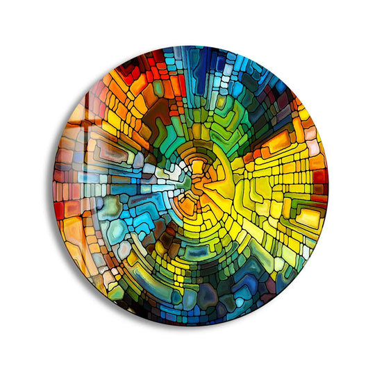 The stark white negative space highlights the colorful, segmented design of this round stained yellow best glass art, creating a captivating radial pattern.