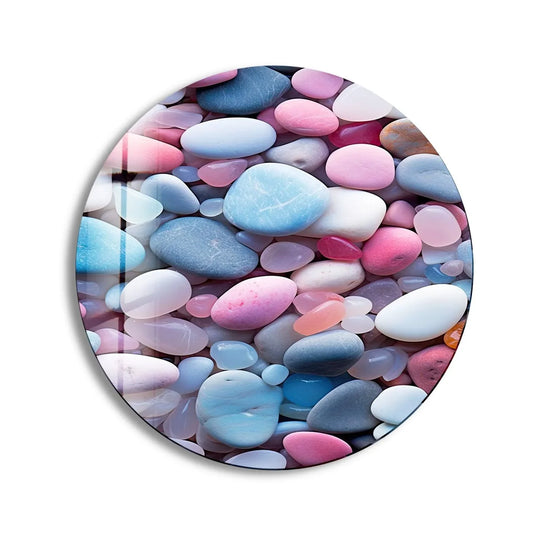 Cool and warm tones blend in this zen spa stones round glass wall art, offering unique home decor with pink, blue, and white hues.