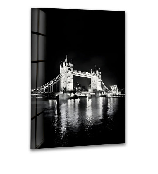 City Prints glass wall art featuring Tower Bridge in black and white and London city architecture and monochrome tones reflecting in the water