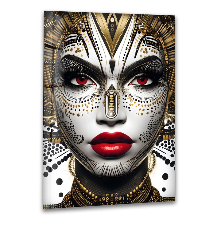 A mesmerizing black and white glass wall art featuring a striking tribal-inspired face with golden details.

