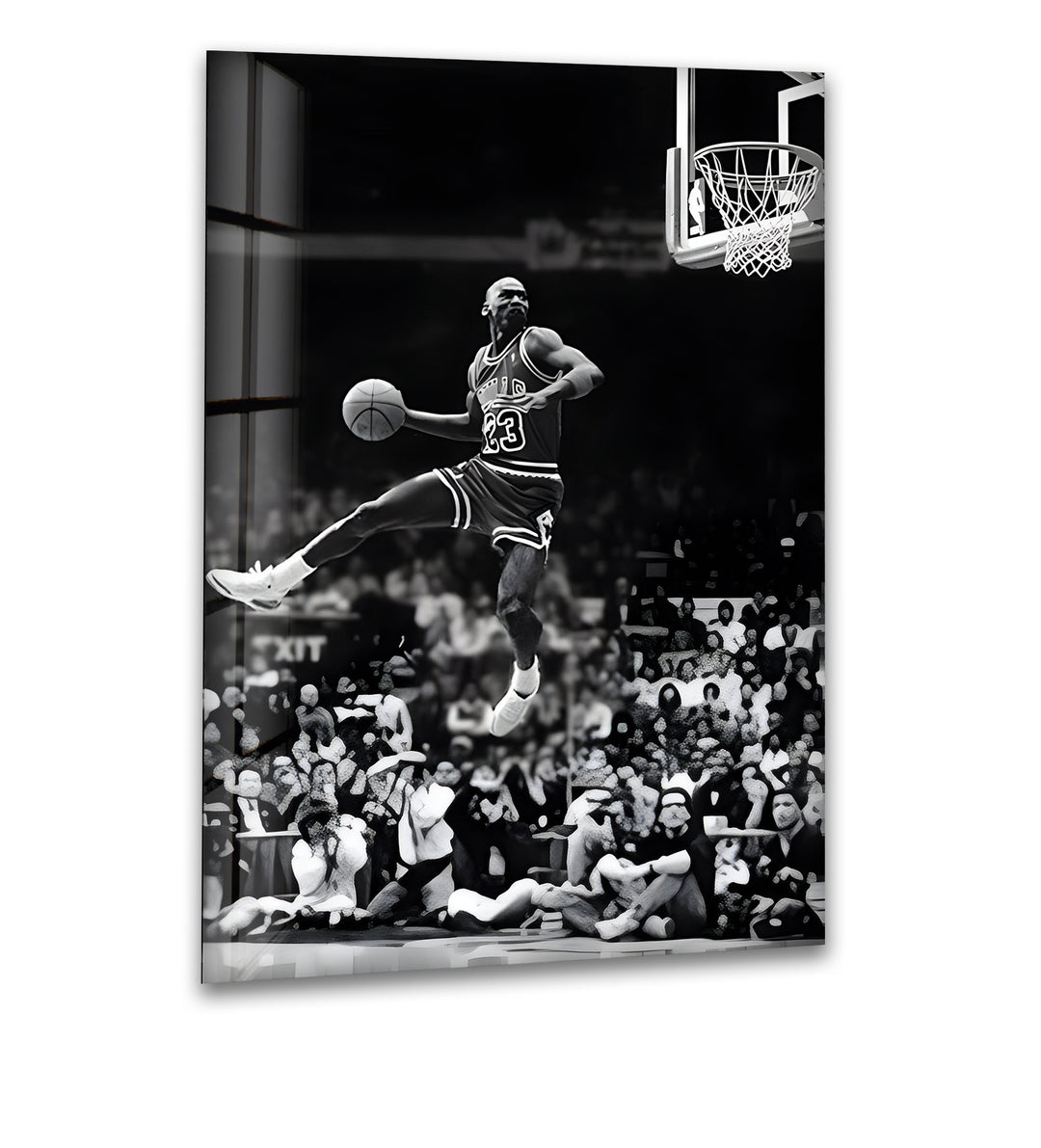 A legendary black and white glass wall art capturing Michael Jordan soaring for a powerful dunk.

