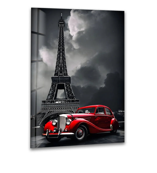 Juxtaposing scarlet and grayscale, this black and white glass wall art captures a red vintage car before the Eiffel Tower, providing striking home decoration.