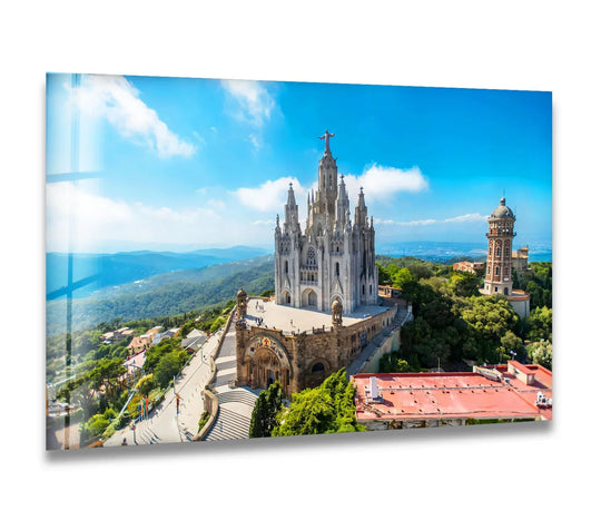 Horizontal rectangular glass art painting shows the Tibidabo Cathedral with its iconic towers and a majestic view of Barcelona's mountain and church.