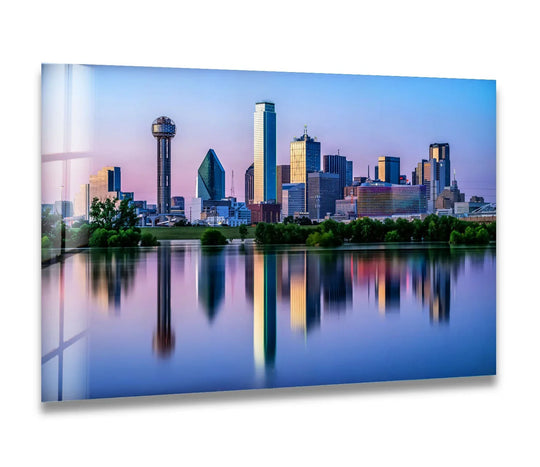 Gradient hues capture the transition of colors in this Dallas skyline glass printing, reflecting the city's skyscrapers across tranquil water.