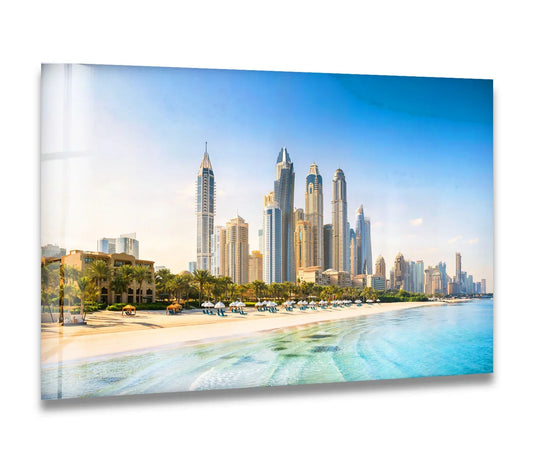 Azure water, the softest element, graces the shore beneath the Dubai skyline as a stunning glass wall art piece perfect for home decoration.