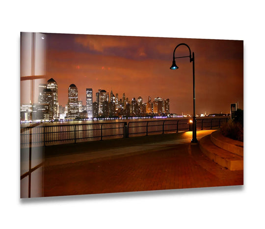 City Prints glass wall art skyline night view and New York City urban elegance with waterfront promenade