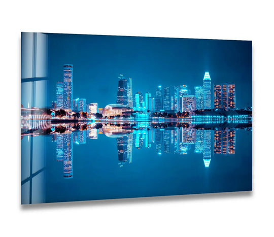 Shadows accentuate the radiant reflections of the Singapore skyline at night on the water in these vibrant glass wall prints.