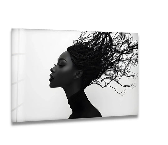 Monochromatic abstract glass printing features a black and white profile of a woman with windblown hair and a high-neck top.