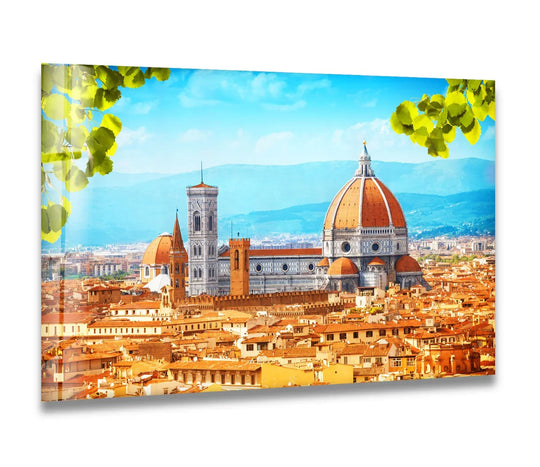 Lush leaves frame this captivating Florence skyline glass wall art decor, highlighting the Duomo cathedral with its naturally flowing lines set against the organic cityscape.