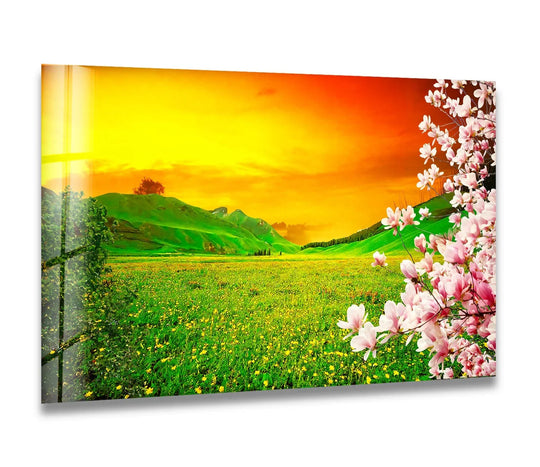 The sunset meadow glass art beautifully captures the transition between the vibrant, warm hues of the sky and the cool greens of the flower-filled landscape, showcasing the best glass art.