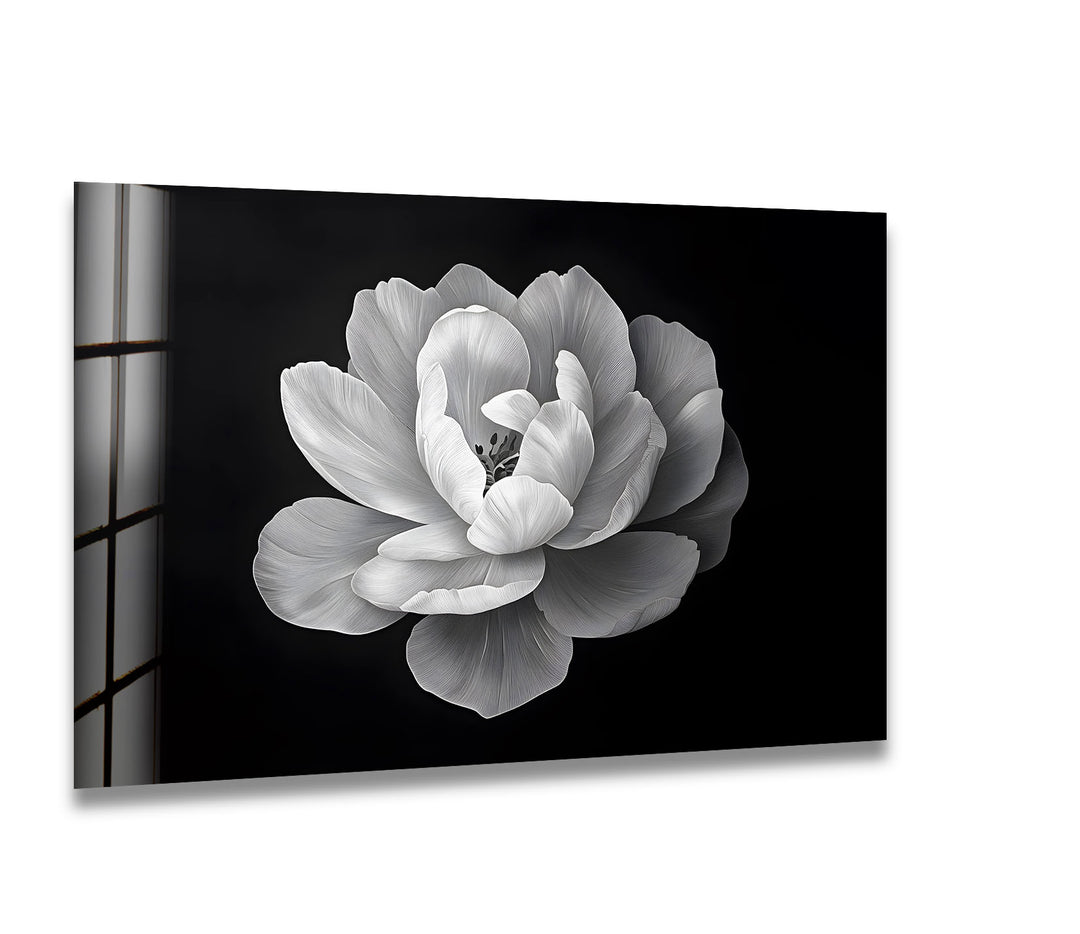 A stunning black and white glass wall art featuring a delicately detailed blooming flower.