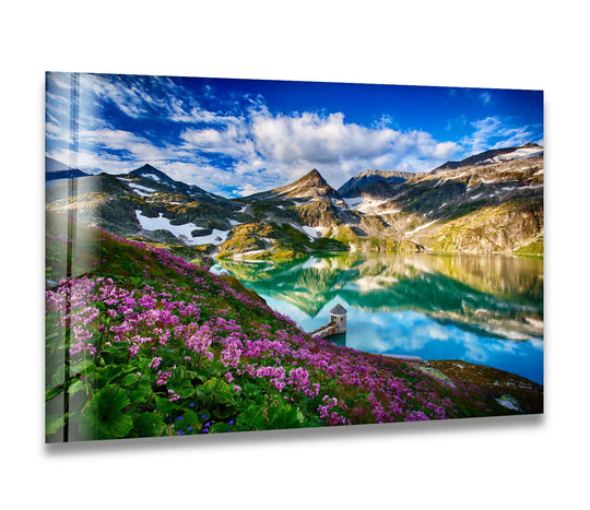 Highlighting the edge and borders of this Norwegian Fjord glass, this decorative wall art shows a majestic mountain reflecting in a tranquil lake amidst floral blossoms.