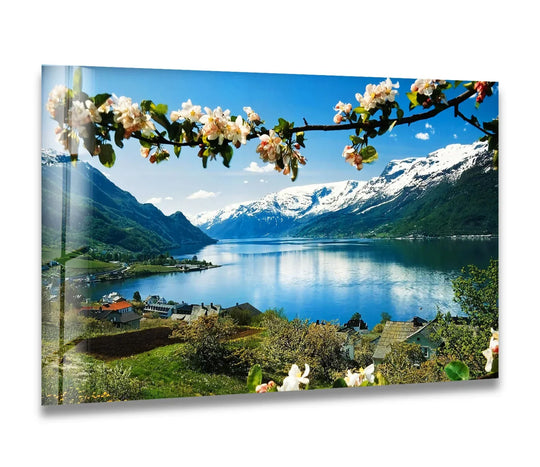 Highlighting the luminous finish, this captivating Norwegian Fjord landscape showcases stunning art from glass featuring majestic mountains, a serene lake, and blossoming flowers.