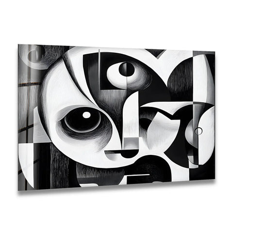 A striking glass wall art decor piece evokes a dramatic, enigmatic mood with its bold cubist black and white composition.