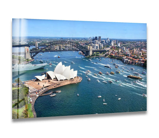 Sky's soft azure offers a tranquil backdrop, highlighting the iconic Sydney Opera House and Harbour Bridge in this stunning tempered glass wall art print.